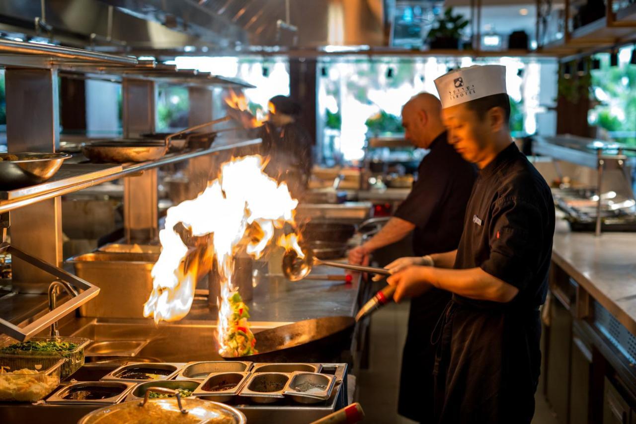 King Solomon By Isrotel Collection Ejlat Exteriér fotografie A wok being used in a restaurant